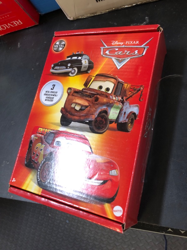 Photo 1 of Mattel Disney and Pixar Cars Toys, Radiator Springs 3-Pack of Die-cast Toy Cars & Trucks with Lightning McQueen, Mater & Sheriff