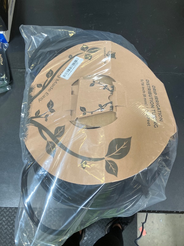 Photo 1 of CARPATHEN 5/16 Drip Irrigation Tubing - 200 ft Black Mainline - (.42" OD x .30" ID) 100 ft PVC Water Line