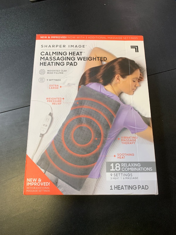 Photo 1 of Calming Heat Massaging Weighted Heating Pad by Sharper Image- Weighted Electric Heating Pad with Massaging Vibrations, 9 Settings- 3 Heat, 6 Massage- 18 Relaxing Combinations, 12” x 24”, 4 lbs