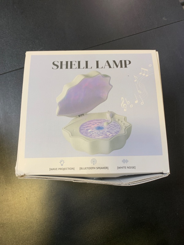 Photo 1 of Northern Lights Projector, Night light projector for bedroom Built-in Bluetooth Speaker, White Noise, Shell Night Light for Room Decor/Gift for Kids/Party/Music/Relaxation/Birthday (White)