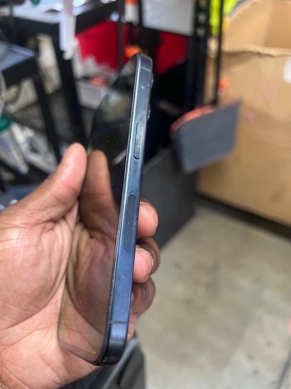 Photo 1 of Apple iPhone 15 Pro - Dark Blue - Unknown Storage, does not charge. Sold for parts. 
