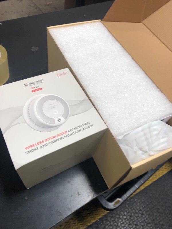Photo 1 of X-Sense Wireless Interconnected Combination Smoke and Carbon Monoxide Detector, 10-Year Battery Powered Fire and CO Alarm, SC06-W, 6-Pack