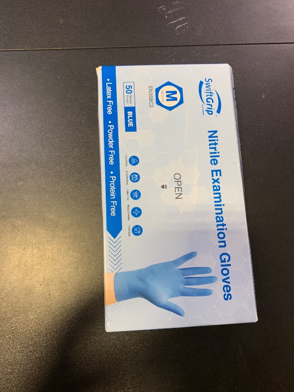 Photo 1 of SwiftGrip Disposable Nitrile Exam Gloves, Blue, Nitrile Gloves Disposable Latex Free, Medical Gloves, Cleaning Gloves, Food-Safe Rubber Gloves, Powder Free, Non-Sterile, 50-ct Box (Medium)