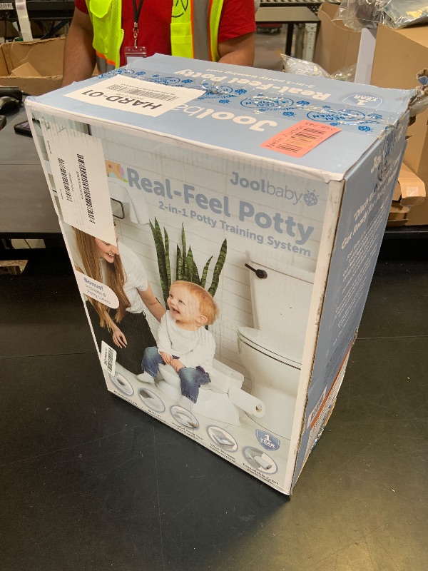 Photo 1 of Real Feel 2-in-1 Potty with Wipes Storage, Flushing Sounds & Disposable Liners - Realistic Toilet - Easy to Clean & Assemble - Jool Baby (Gray)