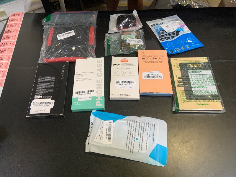 Photo 1 of Bundle of electronic and phone cases