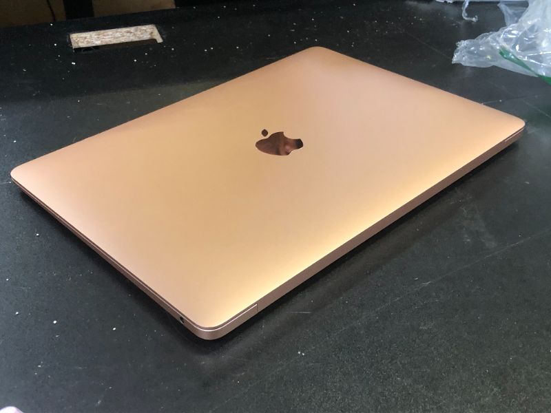 Photo 1 of Apple Early 2020 MacBook Air with 1.1GHz Intel Core i3, 13-inch, 8GB RAM, 256GB SSD Storage, Gold (Renewed)