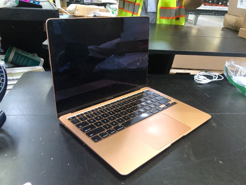 Photo 1 of Apple Early 2020 MacBook Air with 1.1GHz Intel Core i3, 13-inch, 8GB RAM, 256GB SSD Storage, Gold (Renewed)