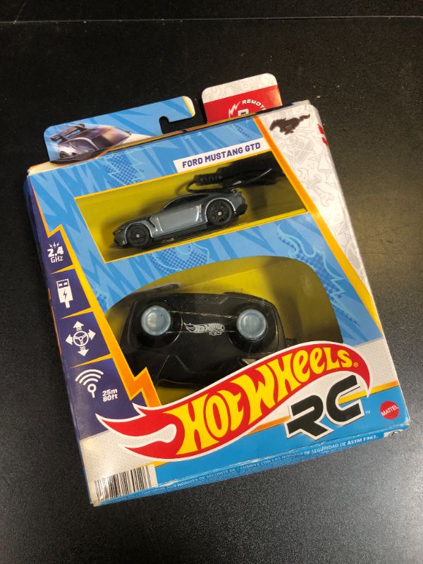 Photo 1 of Hot Wheels RC Toy Car, Full-Function Remote-Control 1:64 Scale Ford Mustang, Booster Button to Race & Stunt Onor Off-Track, Recharge with USB Cable