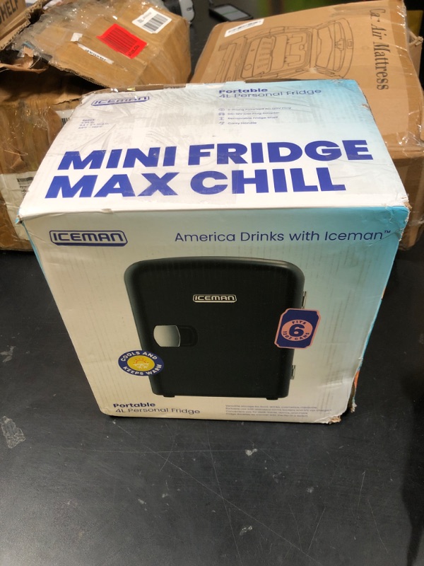 Photo 1 of Chefman - Iceman Mini Portable Black Personal Fridge Cools Or Heats and Provides Compact Storage For Skincare, Snacks, Or 6 12oz Cans W/A Lightweight 4-liter Capacity To Take On The Go