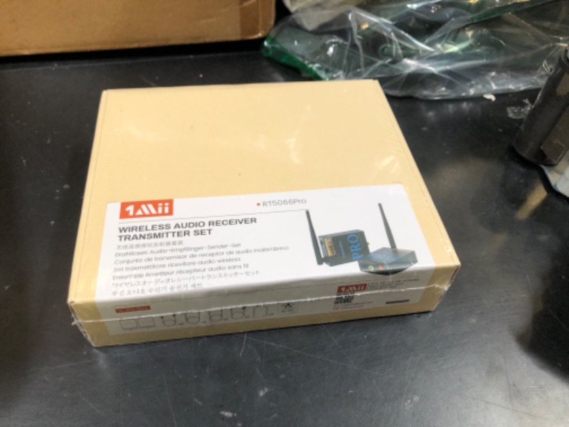 Photo 1 of 1Mii 2.4GHz Wireless Audio Transmitter and Receiver, HiFi Audio, 20ms Low Latency, 320ft Long Range Wireless Subwoofer Kit for Speaker/Stereo/Soundbar,Optical/Coaxial/3.5mm(RCA) Ports.