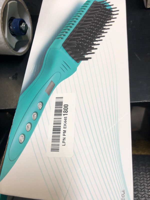 Photo 1 of Moroccanoil Smooth Style Ceramic Heated Brush