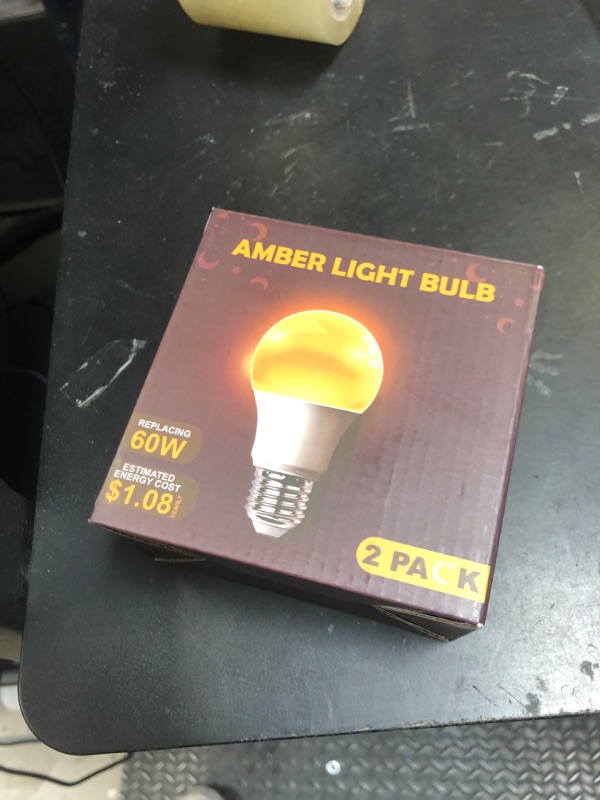 Photo 1 of DALUXshop Amber Sleep Light Bulbs, Blue Light Blocking, A19 9W(60 Watt Equivalent) Dim Light Bulbs for Lamp, 1800K Warm Light Bulb, E26 for Healthy Sleep, Bedroom, Kids Room, 2 Pack