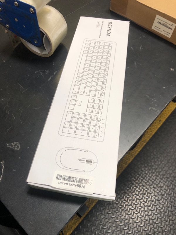Photo 1 of Wireless Keyboard and Mouse Combo - Full Size Slim Thin Wireless Keyboard Mouse with Numeric Keypad 2.4G Stable Connection Adjustable DPI (White & Silver)