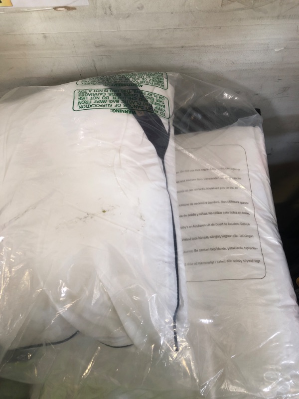 Photo 1 of white pillow 
