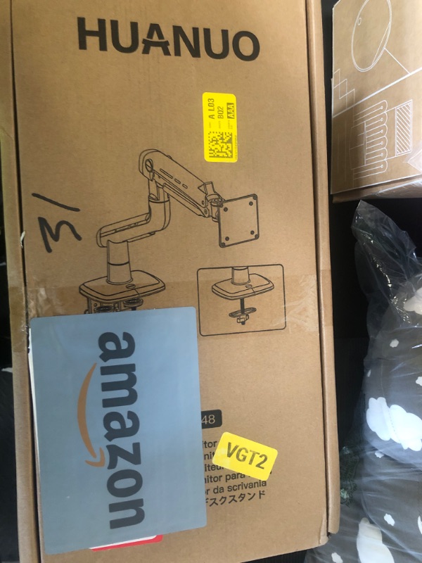 Photo 1 of HUANUO Heavy Duty Monitor Arm for Ultrawide Screens up to 49", Holds 40 lbs,Aluminum Ultrawide Screen Desk Mount,Fully Adjustable Single Monitor Mount with C-clamp, Grommet Base, Max VESA 100x100