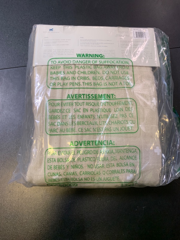 Photo 1 of Little Unicorn Newborn Receiving Quilt | Ultra- Soft, Multi-Layered Muslin Fabric | Gift for Newborns & on-The-go (Taupe Cross)