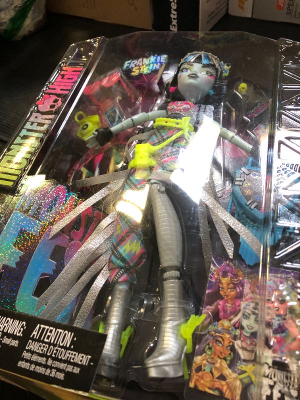 Photo 1 of Monster High Monster Fest Doll, Frankie Stein with Glam Outfit & Festival Themed Accessories Like Snacks, Band Poster, Statement Bag & More