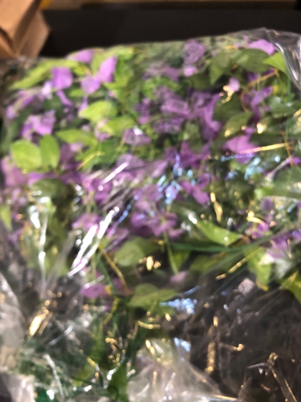 Photo 1 of Lvydec Wisteria Artificial Flowers Garland, 4 Pcs Total 28.8ft Artificial Wisteria Vine Silk Hanging Flower for Home Garden Outdoor Ceremony Wedding Arch Floral Decor (Light Purple)