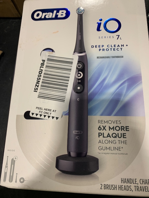 Photo 1 of Oral-B iO Deep Clean + Protect Rechargeable Electric Toothbrush, Black with a iO Series 7 Toothbrush, 2 Replacement Brush Heads, and a Charging Travel Case