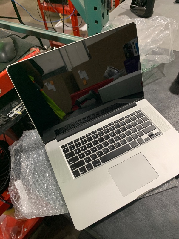 Photo 1 of Apple MacBook Pro 15in Core i7 2.8GHz Retina (MGXG2LL/A), 16GB RAM, 512GB Solid State Drive (Renewed)