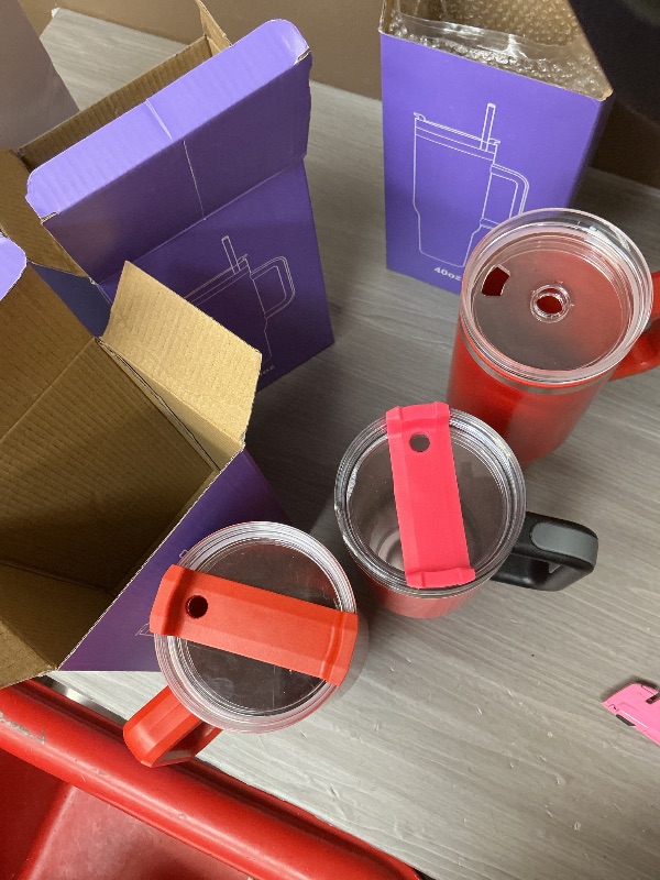 Photo 1 of 4 Pack 40 Oz Tumbler with Handle Bulk, Double Wall Vacuum Insulated Stainless Steel Tumbler with Lid and Straw, 40 oz cup with Silicone Spill Proof Stopper Set (Cream,Purple,Dark Green,Rose Quartz)