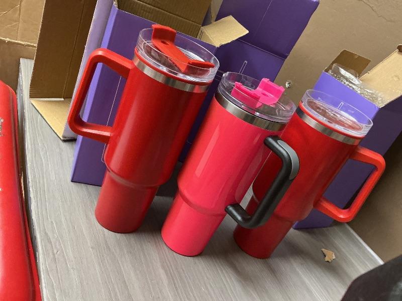 Photo 1 of 4 Pack 40 Oz Tumbler with Handle Bulk, Double Wall Vacuum Insulated Stainless Steel Tumbler with Lid and Straw, 40 oz cup with Silicone Spill Proof Stopper Set (Cream,Purple,Dark Green,Rose Quartz)