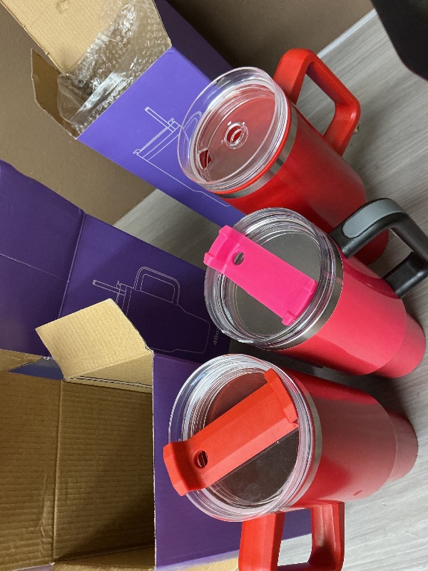 Photo 1 of 4 Pack 40 Oz Tumbler with Handle Bulk, Double Wall Vacuum Insulated Stainless Steel Tumbler with Lid and Straw, 40 oz cup with Silicone Spill Proof Stopper Set (Cream,Purple,Dark Green,Rose Quartz)