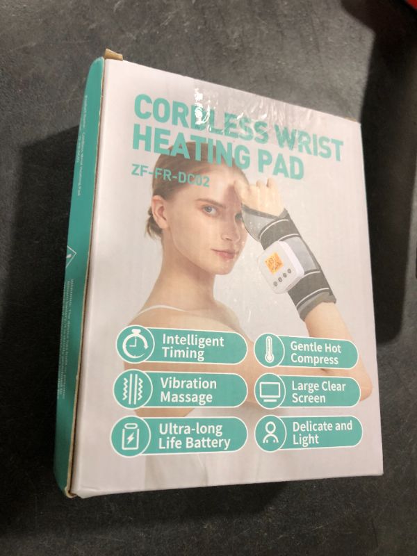 Photo 1 of Rechargeable Wrist Heating Pad Wrap for Pain Relief, Heated Wrist Massager Heat Therapy for Carpal Tunnel Relief, Sprains, Swelling, Tendonitis Hand Pain, 3 Vibration Mode, 3 Heat Level, Auto Shut Off