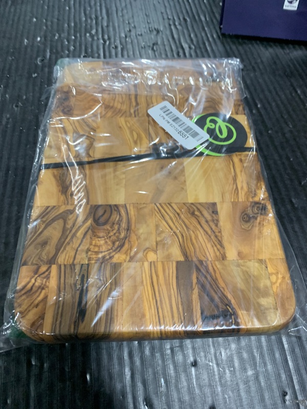 Photo 1 of Bayu Handcrafted Olive Wood Charcuterie Board and Serving Platter, 12" x 8" x 0.8" Olive Wood Cutting Board with Rustic Natural Finish, Wooden Kitchen Accessories