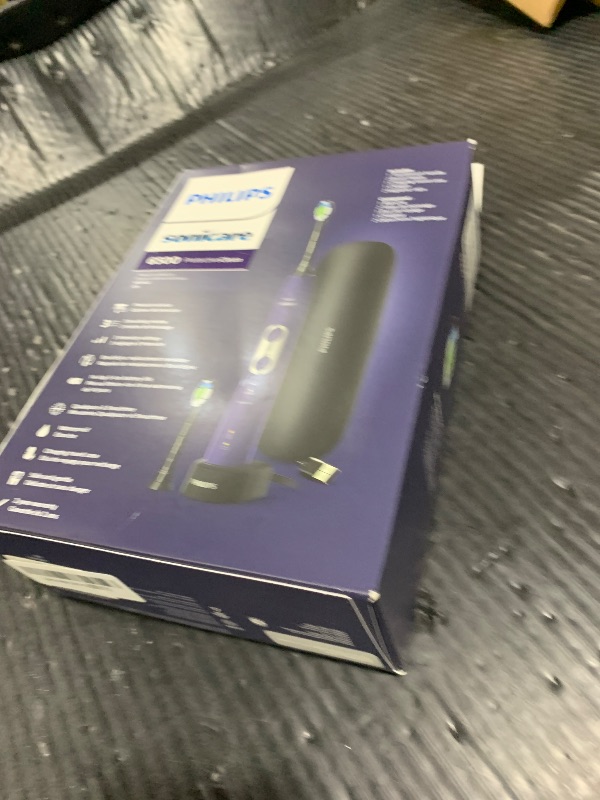 Photo 1 of PHILIPS Sonicare Protective Clean 6500 Rechargeable Electric Toothbrush with Charging Travel Case and Extra Brush Head, Deep Purple, 2 Count
