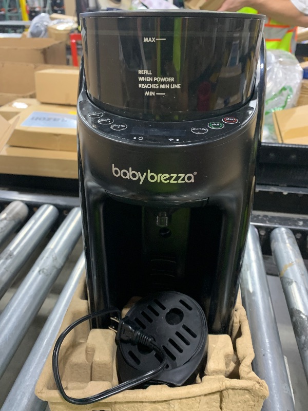 Photo 1 of Baby Brezza Formula Pro Advanced WiFi Formula Dispenser - Automatically Mix a Warm Formula Bottle From Your Phone Instantly – Easily Make Bottle With Automatic Powder Blending Machine, Black