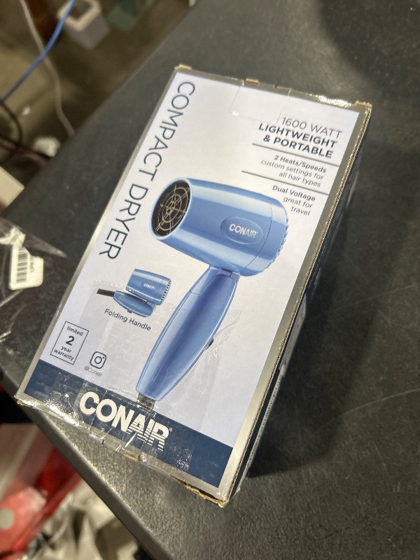 Photo 1 of Conair Travel Hair Dryer with Dual Voltage, 1600W Compact Hair Dryer with Folding Handle, Travel Blow Dryer
