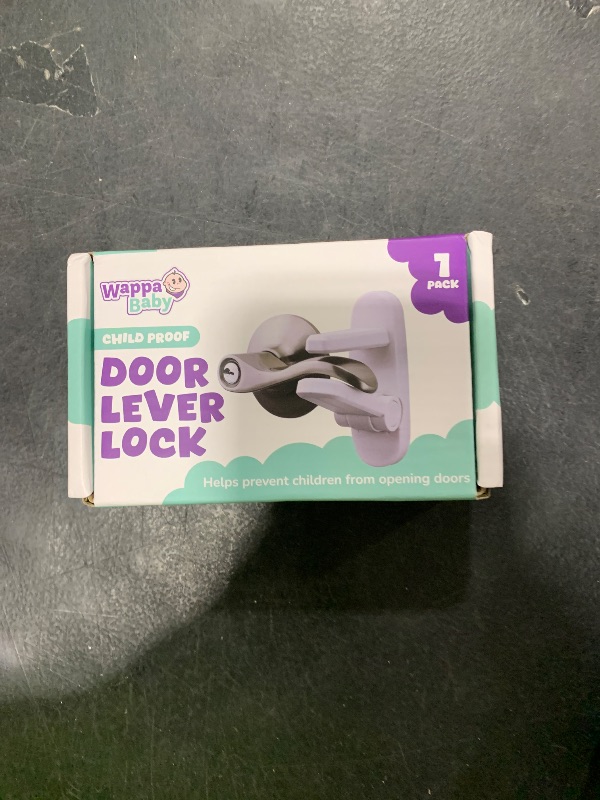 Photo 1 of Door Lever Lock (1 Pack) Prevents Toddlers from Opening Doors. 3.25" L * 1.5" W * 4.5" H Easy One Hand Operation for Adults. Durable ABS with 3M Adhesive Backing. Simple Install, No Tools Needed.