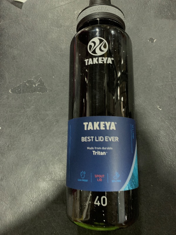 Photo 1 of Takeya Tritan Sport Water Bottle with Spout Lid - BPA-Free & Dishwasher-Safe Water Bottle - Reusable Bottle with Lid Handle - Simple Leak-Proof Water Bottle - 40 oz, Black