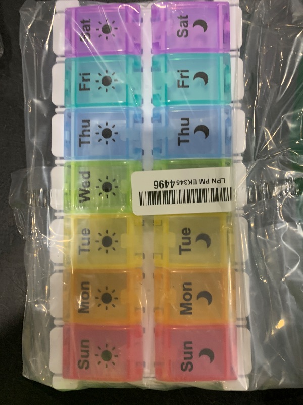 Photo 1 of HRX Package Medicine Pill Boxes 7 Day AM/PM, Easy Fill & Open Medication Organizer Vitamin Reminder Holder Day and Night