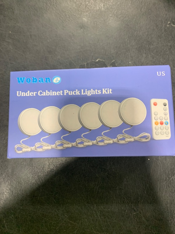 Photo 1 of WOBANE LED Puck Lights, Wired Under Cabinet Lighting Kit with Remote, Dimmable LED Counter Lighting for Kitchen,Closet,Bookshelf,Shelf,1050lm,6000K White,Super Bright,Timing, Set of 6