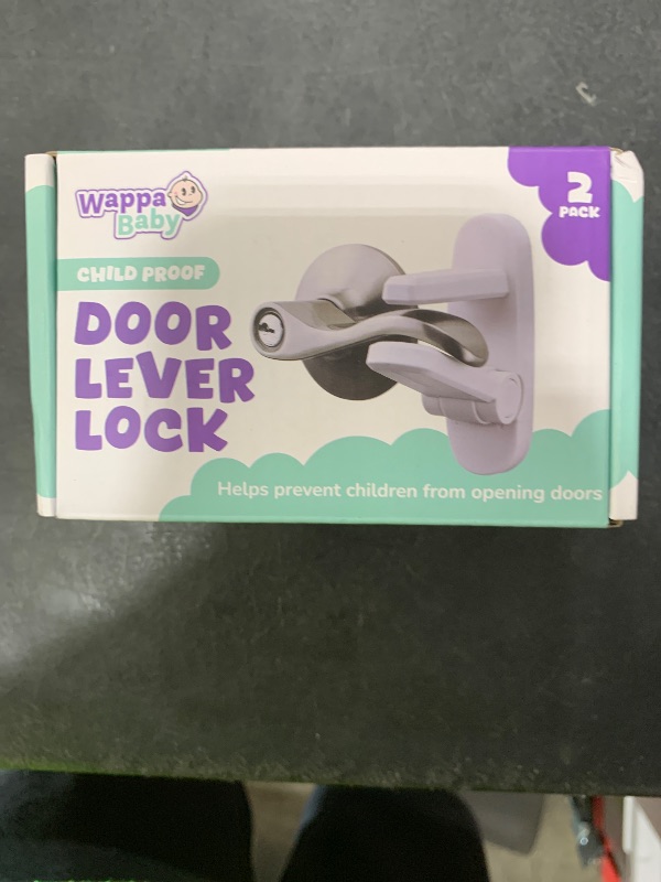 Photo 1 of Door Lever Lock (2 Pack) – Prevents Toddlers from Opening Doors – Easy One-Hand Operation for Adults – Durable ABS with 3M Adhesive Backing – No Tools Needed for Install