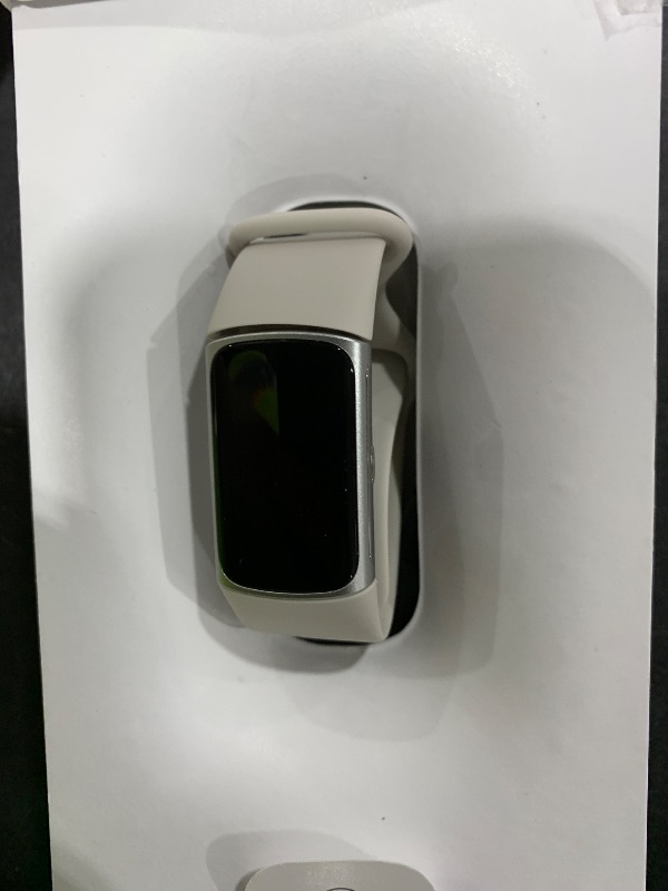 Photo 1 of Fitbit Charge 6 Fitness Tracker with Google apps, Heart Rate on Exercise Equipment, 6-Months Premium Membership Included, GPS, Health Tools and More, Porcelain/Silver, One Size (S & L Bands Included)