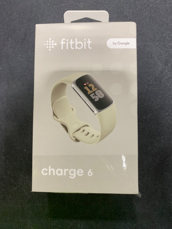 Photo 1 of Fitbit Charge 6 Fitness Tracker with Google apps, Heart Rate on Exercise Equipment, 6-Months Premium Membership Included, GPS, Health Tools and More, Porcelain/Silver, One Size (S & L Bands Included)