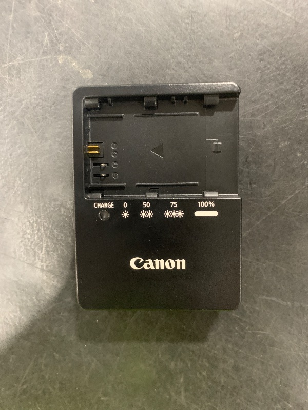 Photo 1 of CANON - EOS 90D 343055002256 Megapixel, 4K UHD Video DSLR Camera ( BODY ONLY) with battery charger

