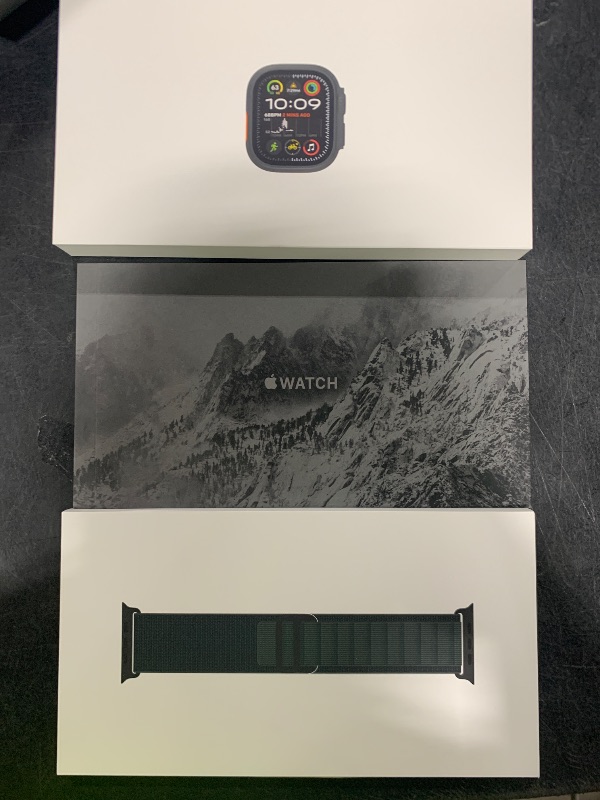 Photo 1 of Apple Watch Ultra 2 [GPS + Cellular, 49mm] Black Titanium Case with Green Alpine Loop, M (Renewed)