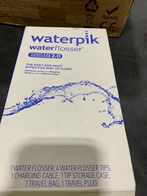 Photo 1 of Waterpik Cordless Advanced 2.0 Water Flosser For Teeth, Gums, Braces, Dental Care With Travel Bag and 4 Tips, ADA Accepted, Rechargeable, Portable, and Waterproof, Gray WP-587, Packaging May Vary