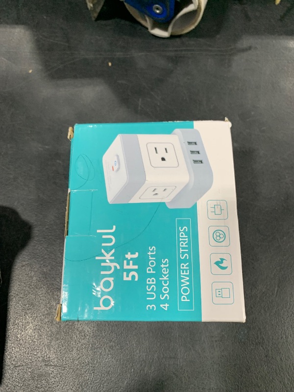 Photo 1 of Power Strip with USB Baykul Flat Plug Extension Cord Cube with 4 Outlets 3 USB Ports 5ft Power Cord Surge Protector Desktop Charging Station Overload Protection Compact Portable for Home Travel Office