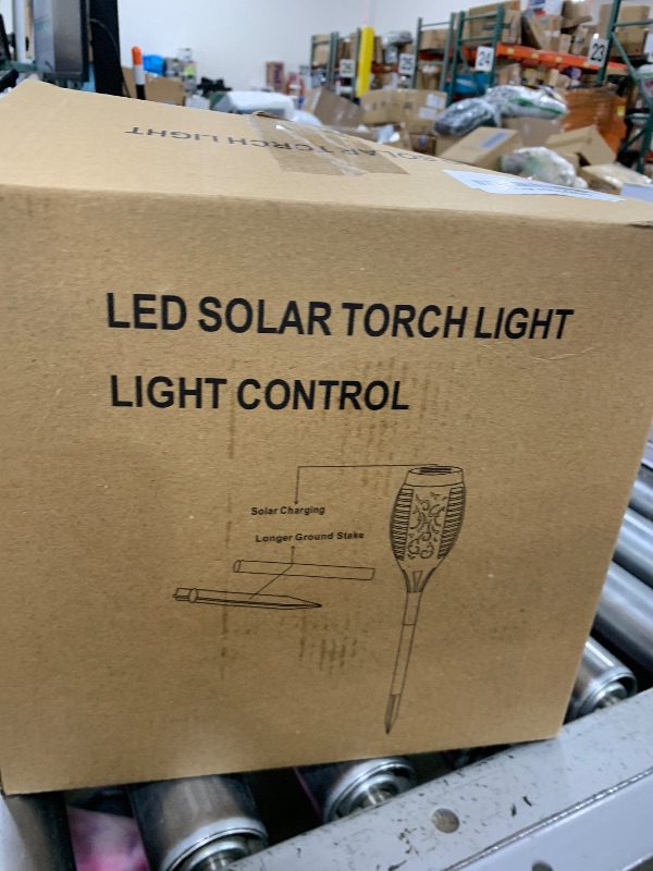 Photo 1 of 10 Pack Solar Lights Outdoor, Mini Solar Torch Lights with Flickering Flame for Halloween Decor, Solar Halloween Lights Waterproof Solar Powered Outdoor Lights for Garden Pathway Patio Yard Porch