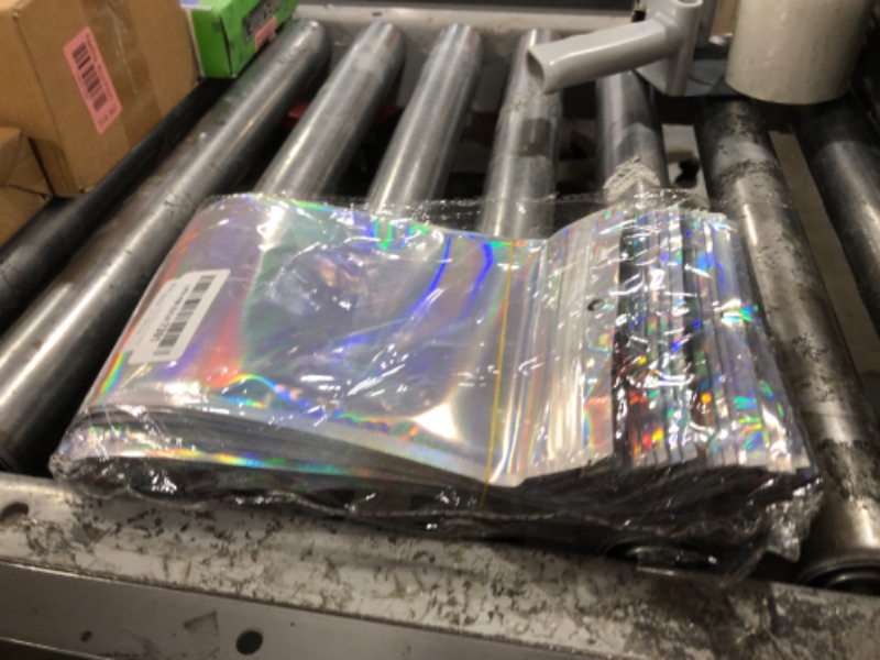 Photo 1 of Trunple Smell Proof Bags & Resealable Foil Pouch Sample Bag [100 PCS ] Great for Party Favor Food Storage (Holographic Color) (6x9 Inch)