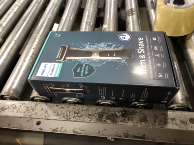 Photo 1 of Philips Norelco Bodygroom 7000 Series, Showerproof Groin and Body Trimmer for Men, Precise Body Grooming, Adjustable Comb, Safe Even Below The Belt, 80 Min. Runtime, Model BG7030/49