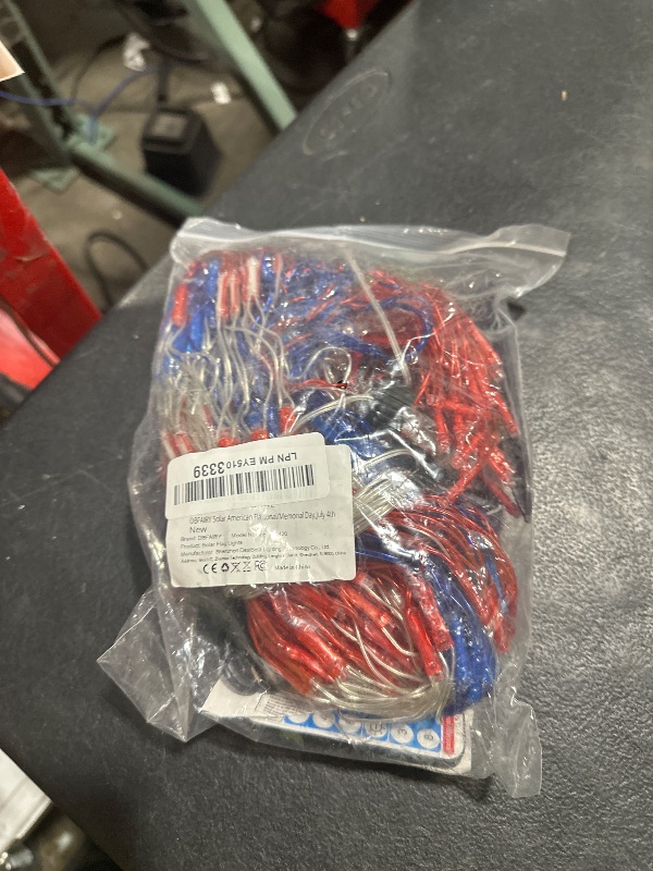 Photo 1 of DBFAIRY Solar American Flag Lights Outdoor,420 LEDs American Flag Net Lights 6.5ft x 3.28ft Super Bright,Memorial Day Decorations of The United States for Independence/National/Memorial Day,July 4th