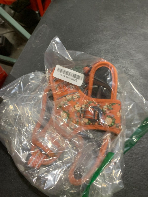 Photo 1 of Timos Dog Harness for Medium Dogs, No Pull Service Vest with Reflective Strips and Control Handle,No Choke Dog Harness with 2 Metal Rings for Easy Walking,Outdoor Training,Flower Orange, M