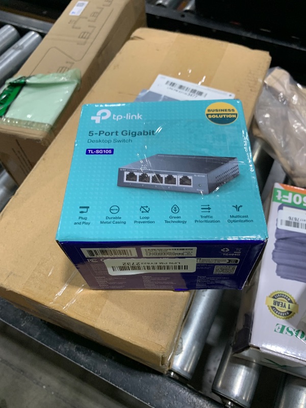 Photo 1 of TP-Link TL-SG105, 5 Port Gigabit Unmanaged Ethernet Switch, Network Hub, Ethernet Splitter, Plug & Play, Fanless Metal Design, Shielded Ports, Traffic Optimization