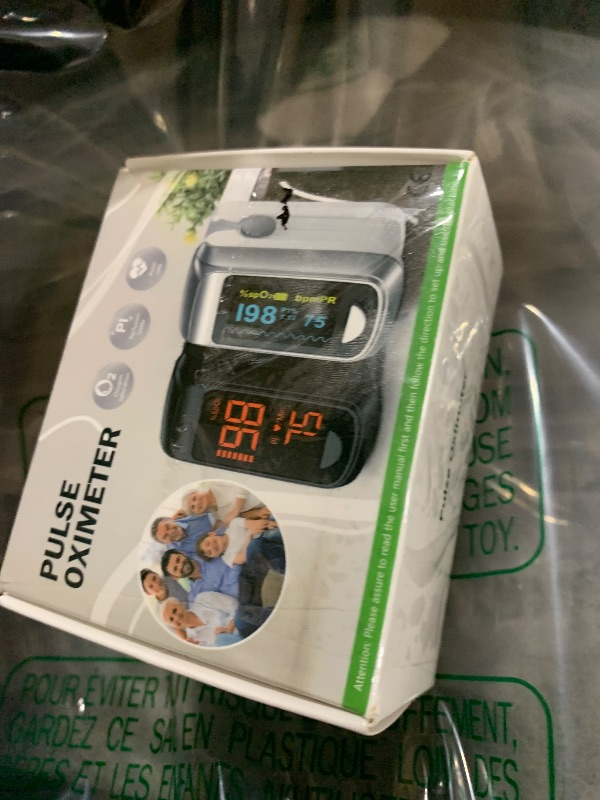 Photo 1 of Fingertip Pulse Oximeter Blood Oxygen Monitor Pulse Ox, Heart Rate and Fast Spo2 Reading Oxygen Meter with OLED Screen Included Batteries and Lanyard